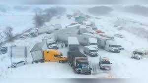 100 vehicles pile up in Michigan crash as snowstorm moves across the country